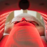 woman undergoing hydrafacial led light therapy